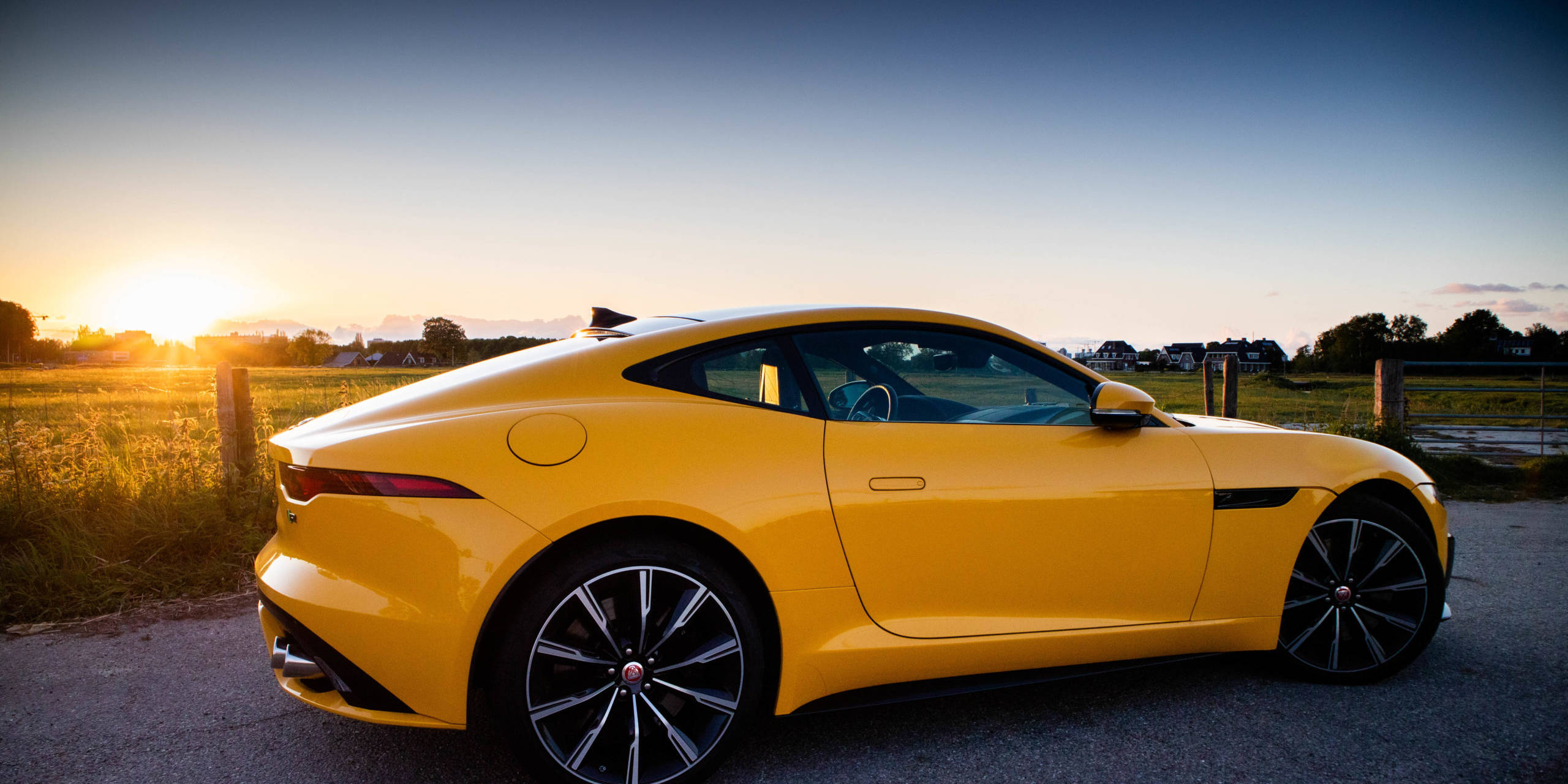 Jaguar F-Type Coupe P575R with sunset in Oudekerk aan de Amstel